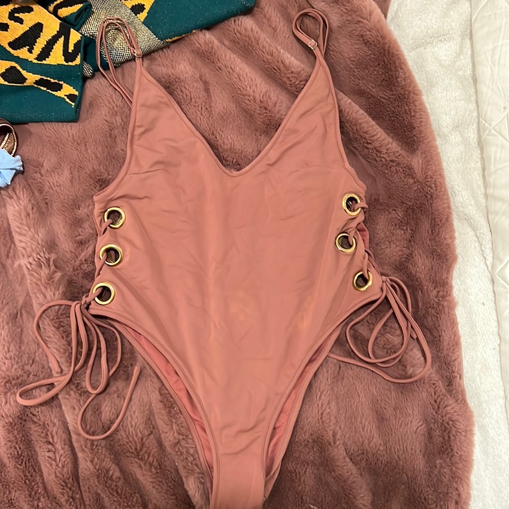 Neon blonde one piece suit